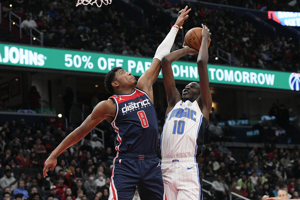 Rui Hachimura (#8) of the Washington Wizards deflects a shot by Bol Bol of the Orlando Magic in the game at Capital One Arena in Washington, D.C., January 21, 2023. /CFP