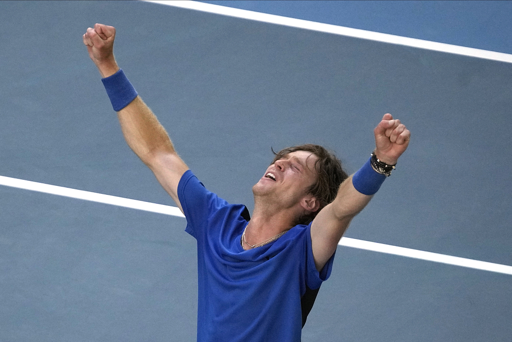 Andrey Rublev of Russia celebrates after defeating Holger Rune of Denmark in their fourth round match at the Australian Open, January 23, 2023. /CFP