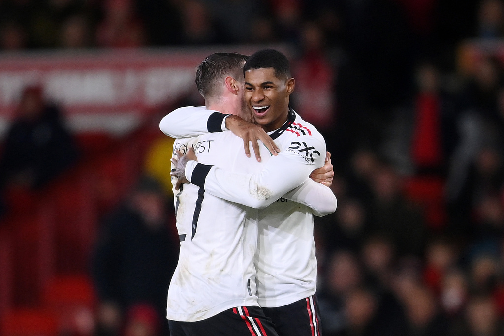 Manchester United striker Marcus Rashford (L) celebrates with teammate Wout Weghorst during their League Cup clash with Nottingham Forest at the City Ground stadium in Nottingham, England, January 25, 2023. /CFP