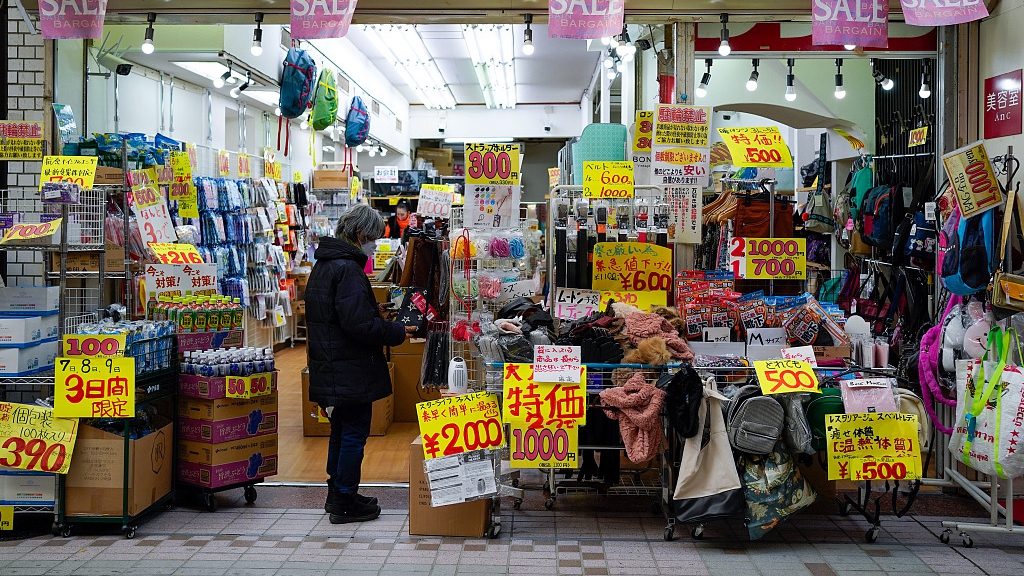 A shopper looks at products at a shop in Tokyo, Japan, January 10, 2023. /CFP