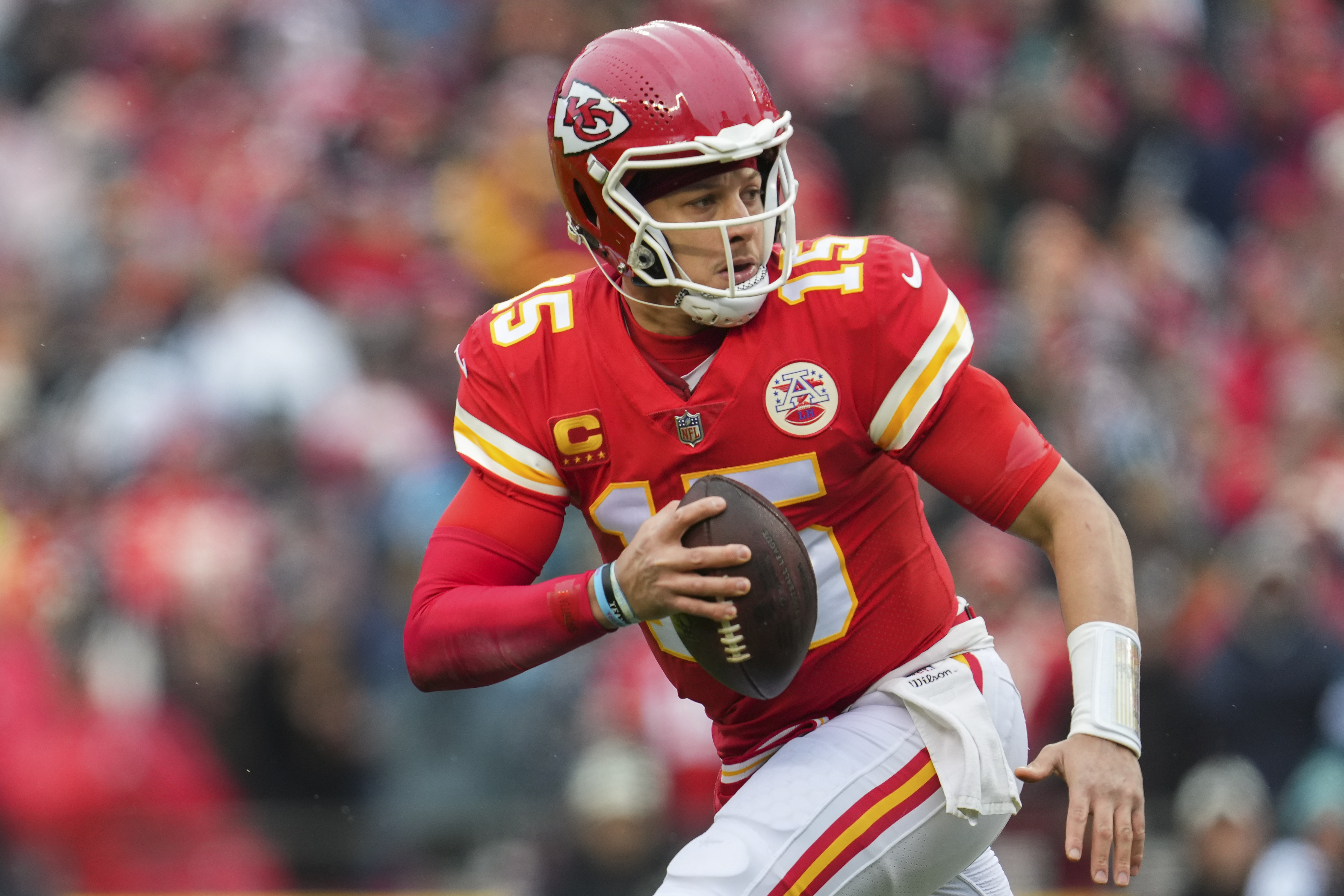 Quarterback Patrick Mahomes of the Kansas City Chiefs runs with the ball in the NFL American Football Conference Divisional Round game against the Jacksonville Jaguars at Arrowhead Stadium in Kansas City, Missouri, January 21, 2023. /CFP