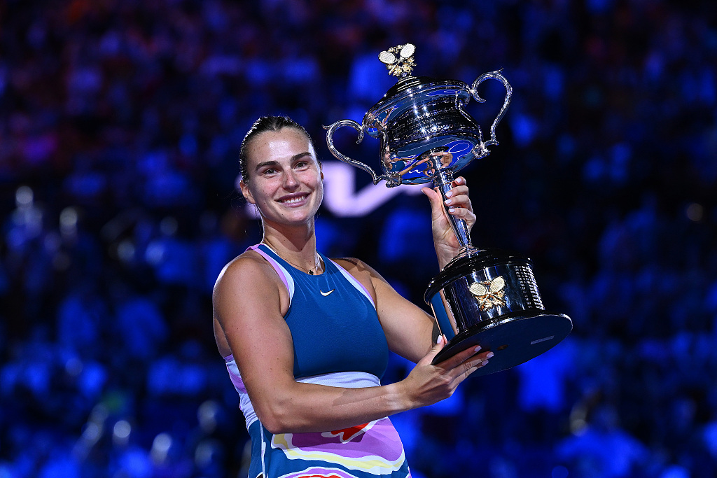Aryna Sabalenka of Belarus poses with the Daphne Akhurst Memorial Cup after defeating Elena Rybakina of Kazakhstan 2-1 (4-6, 6-3 and 6-4) in the Australian Open women's singles final at Melbourne Park in Melbourne, Australia, January 28, 2023. /CFP