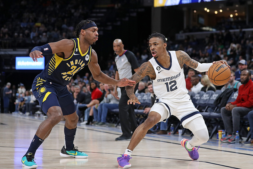 Ja Morant (#12) of the Memphis Grizzlies dribbles in the game against the Indiana Pacers at FedExForum in Memphis, Tennessee, January 29, 2023. /CFP
