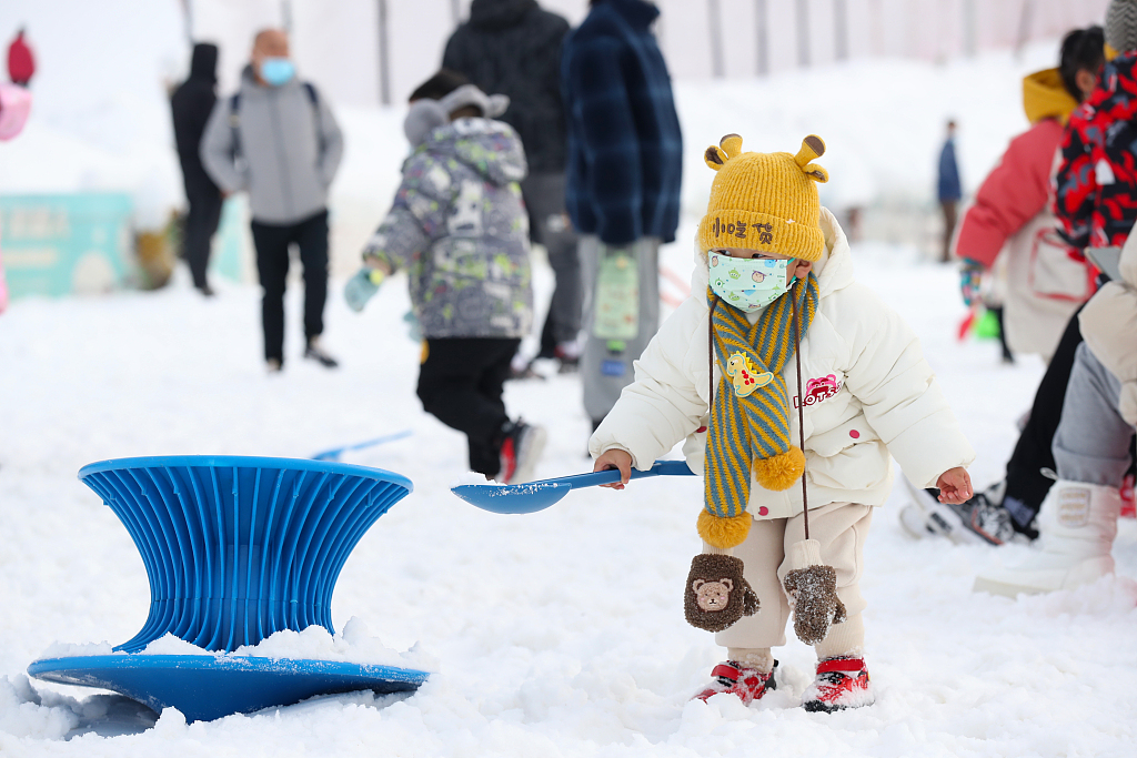 A child plays at a snow resort in Yinchuan, capital of Ningxia Hui Autonomous Region, China, January 28, 2023. /CFP