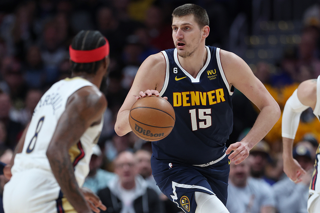 Nikola Jokic (#15) of the Denver Nuggets dribbles in the game against the New Orleans Pelicans at Ball Arena in Denver, Colorado, January 31, 2023. /CFP