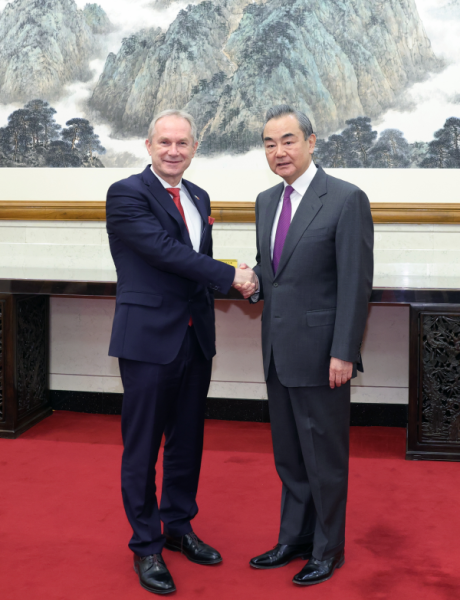 Wang Yi (R), director of the Office of the Foreign Affairs Commission of the CPC Central Committee, shakes hands with President of the 77th session of the United Nations General Assembly Csaba Korosi in Beijing, China, February 2, 2023. /Chinese Foreign Ministry