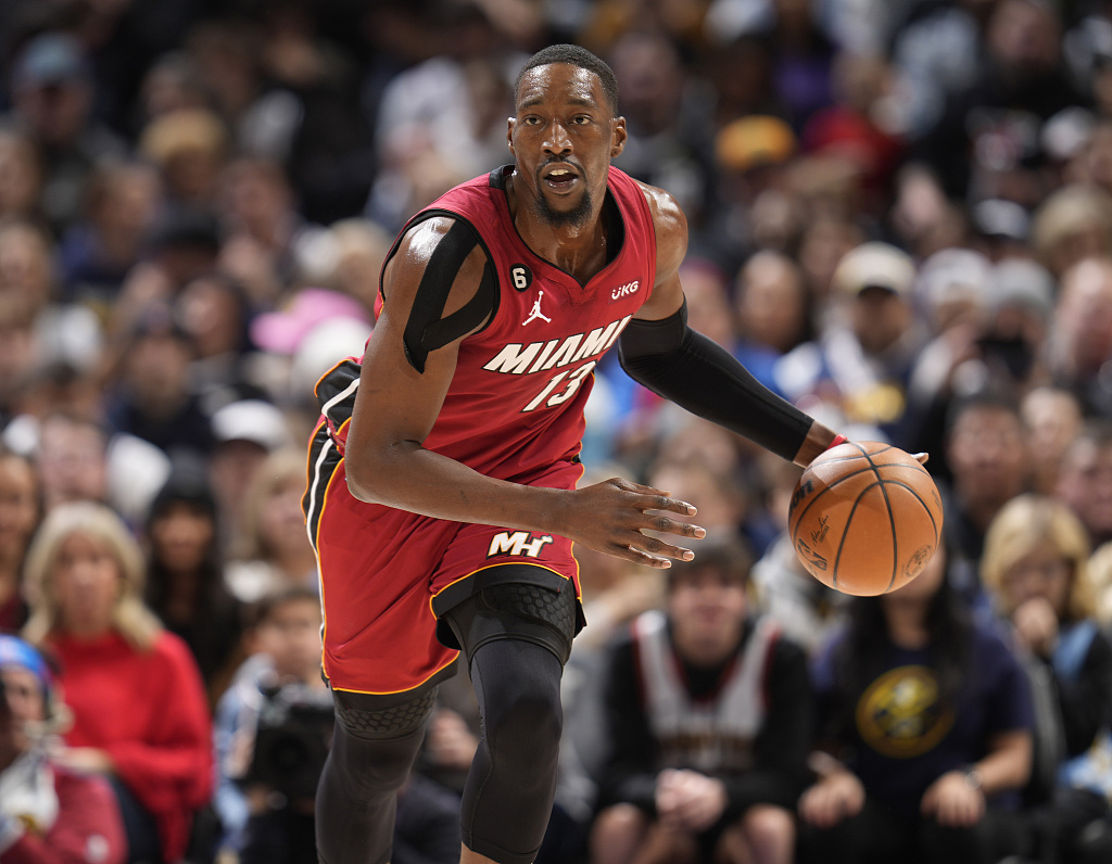 Bam Adebayo of the Miami Heat dribbles in the game against the Denver Nuggets at Ball Arena in Denver, Colorado, December 30, 2023. /CFP