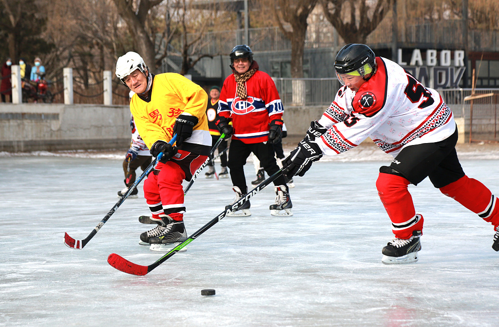 Ice hockey players, at the average age of 65, enjoy the sport in Shenyang, northeast China's Liaoning Province, February 3, 2023. /CFP