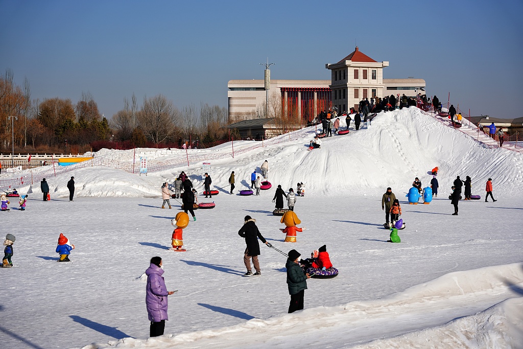 People enjoy sports on the snow in Hohhot, north China's Inner Mongolia Autonomous Region, January 29, 2023. /CFP