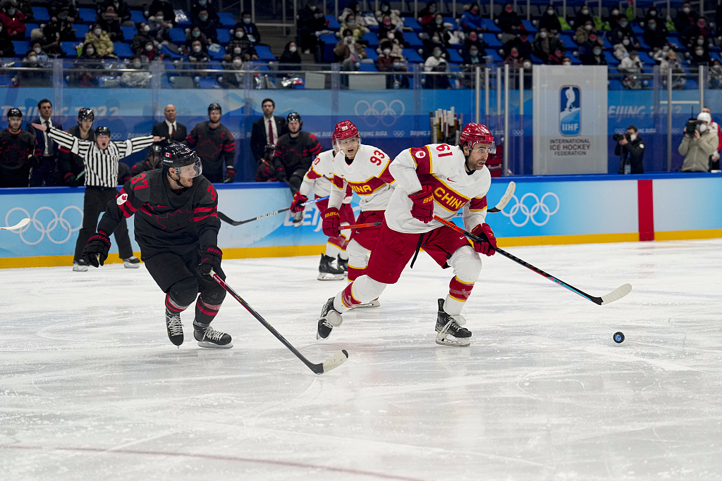 Players in action during the Beijing 2022 men's hockey match between China and Canada at the National Indoor Stadium in Beijing, China, February 15, 2022. /CFP