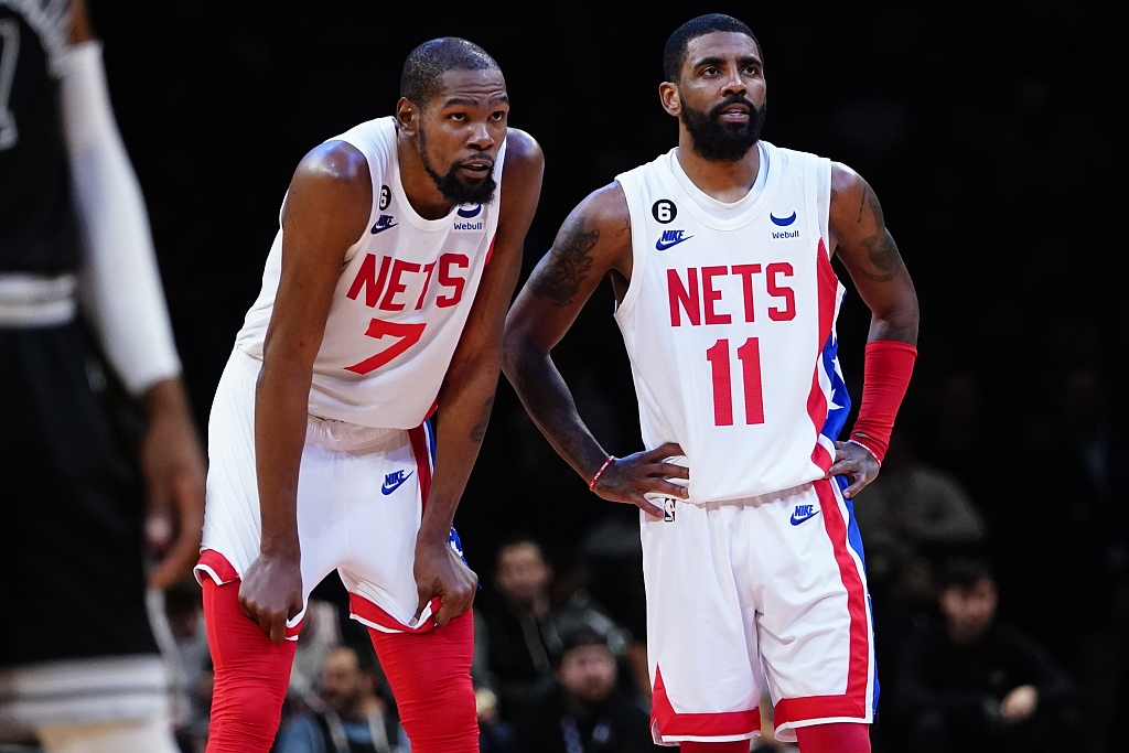 Kevin Durant (#7) and Kyrie Irving of the Brooklyn Nets stand next to each other in the game against the San Antonio Spurs at the Barclays Center in Brooklyn, New York City, January 2, 2023. /CFP