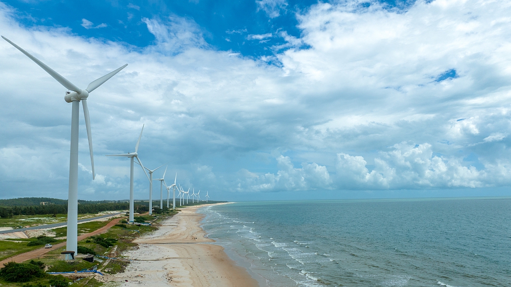 Wind turbines along the coast of Mulan Bay, Wenchang City, in south China's Hainan Province, July 20, 2022. /CFP