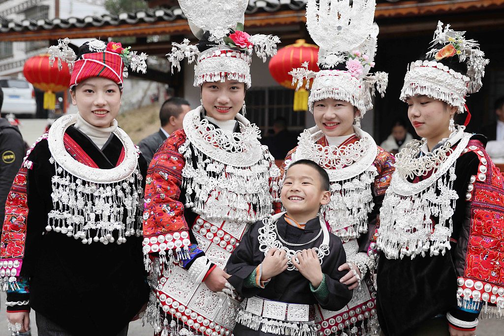 Miao people in ethnic costumes celebrate at a town in Qiandongnan Miao and Dong Autonomous Prefecture, Guizhou Province, on Feb. 1, 2023, to welcome the Lantern Festival. /CFP