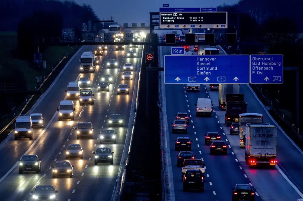 Cars and trucks drive on a highway in Frankfurt, Germany, January 27, 2023. /AP