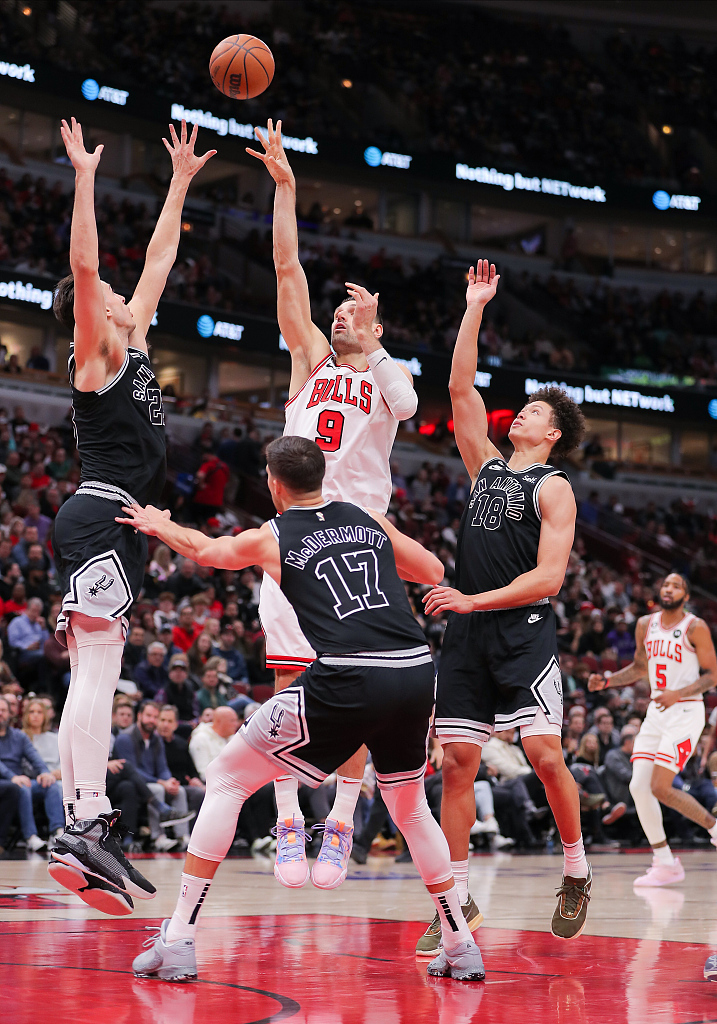 Nikola Vucevic (#9) of the Chicago Bulls shoots in the game against the San Antonio Spurs at the United Center in Chicago, Illinois, February 6, 2023. /CFP