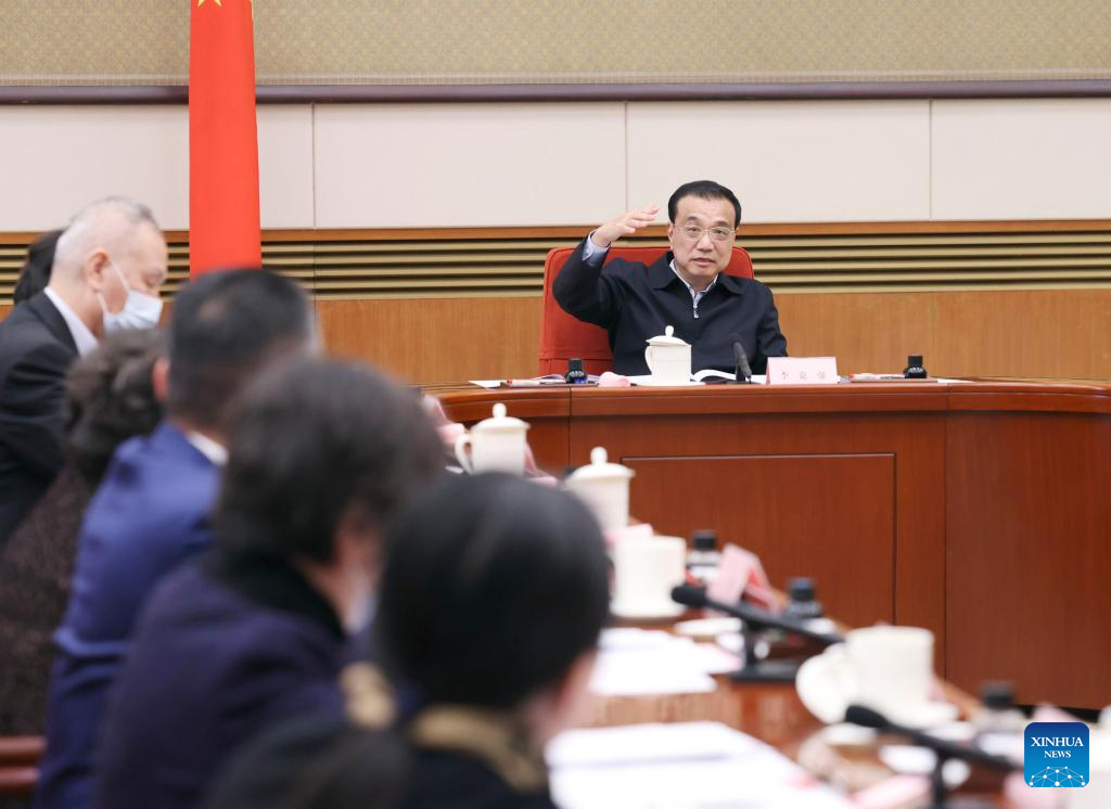 Chinese Premier Li Keqiang chairs a seminar to solicit opinions on the draft government work report from grassroots organization representatives and people from all walks of life, Beijing, capital of China,  February 6, 2023. /Xinhua