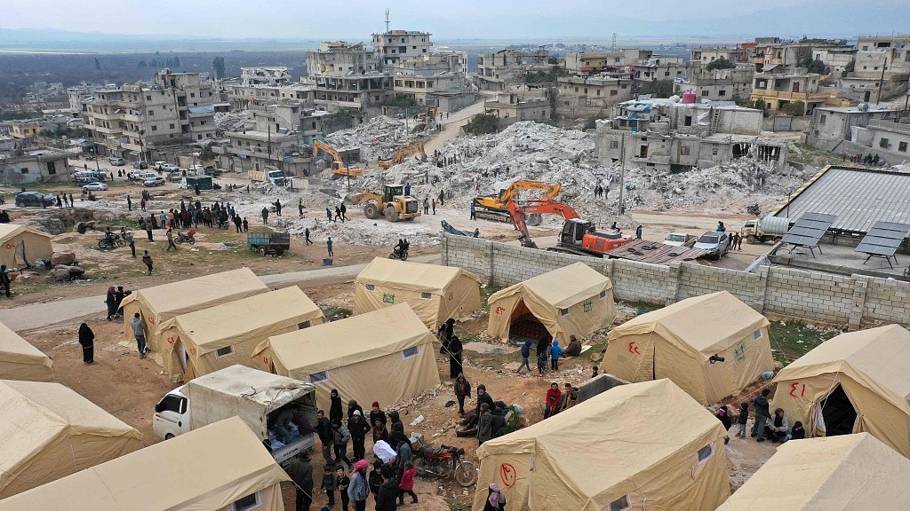 Tents are set up as temporary shelters for people who have been left homeless by earthquake as rescue operations continue amidst the rubble of collapsed buildings in Harim, Syria, February 11, 2023. /CFP