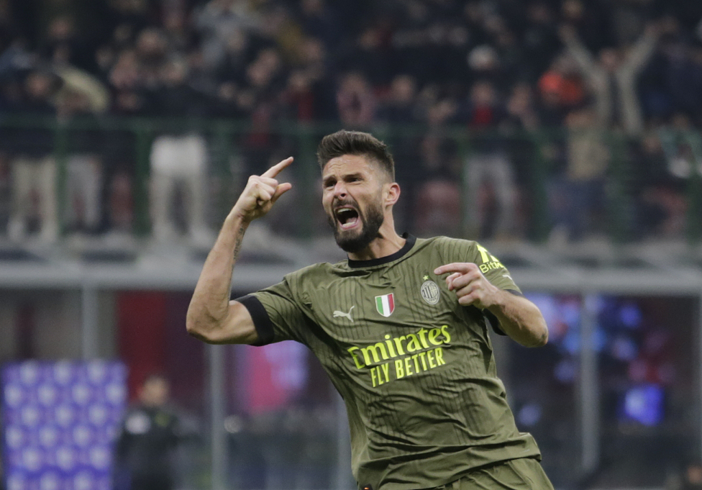 Olivier Giroud of AC Milan celebrates after scoring a goal against Torino during their Serie A match at San Siro Stadium in Milan, Italy, February 10, 2023. /CFP 