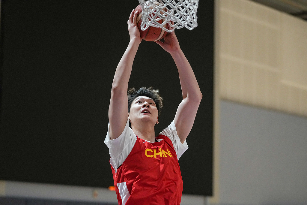 Wang Zhelin of the Chinese men's national basketball team shoots during practice in east China's Shanghai Municipality, February 11, 2023. /CFP