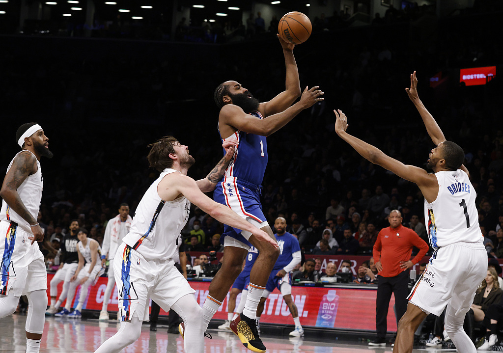 James Harden (C) of the Philadelphia 76ers shoots in the game against the Brooklyn Nets at the Barclays Center in Brooklyn, New York City, February 11, 2023. /CFP