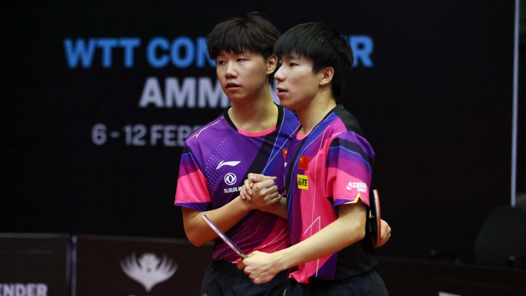 Liu Yebo (L) and Xu Yingbin competes in the men's doubles final at the WTT Contender Amman, Jordan, February 12, 2023. /WTT Weibo account 