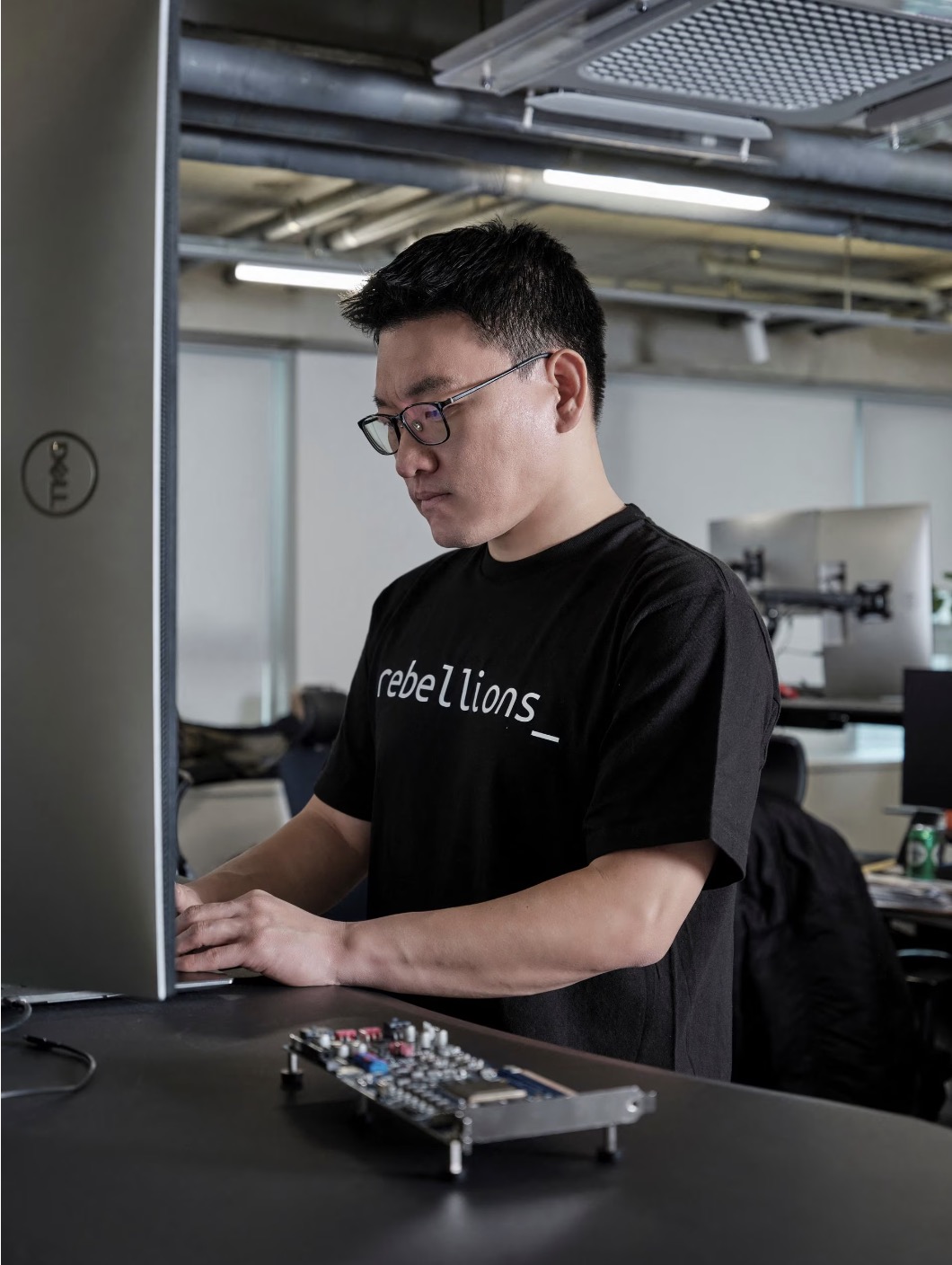  AI chip startup Rebellions co-founder and chief executive Park Sunghyun works at the company headquarters in Seongnam, South Korea, February 2023. /Reuters