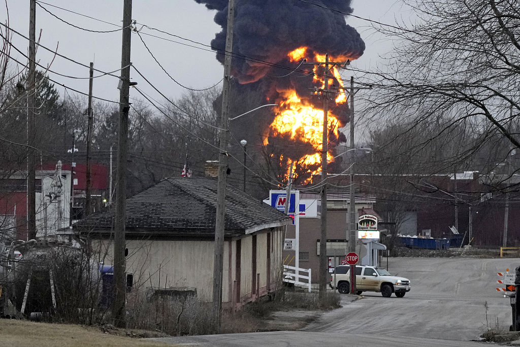 A black plume and fireball rise over East Palestine as a result of a controlled detonation of a portion of the derailed Norfolk and Southern trains, Ohio, the U.S., February 6, 2023. /CFP