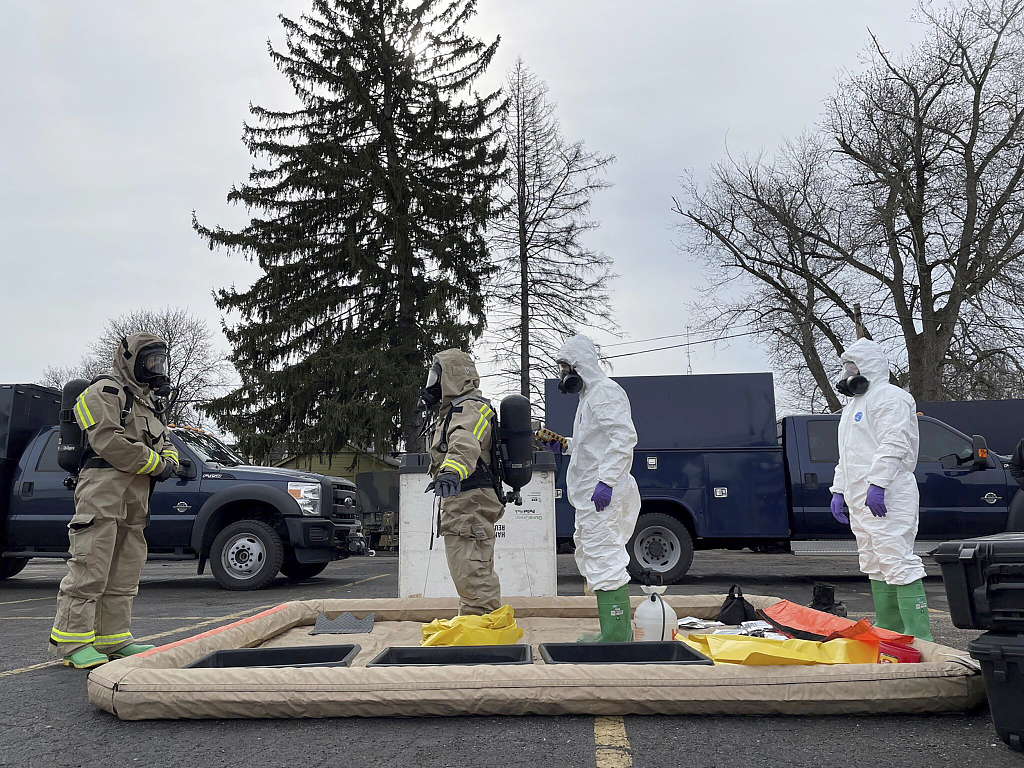 This photo provided by the Ohio National Guard, ONG 52nd Civil Support Team members prepare to enter an incident area to assess remaining hazards with a lightweight inflatable decontamination system (LIDS) in East Palestine, Ohio, the U.S., February 7, 2023. /CFP