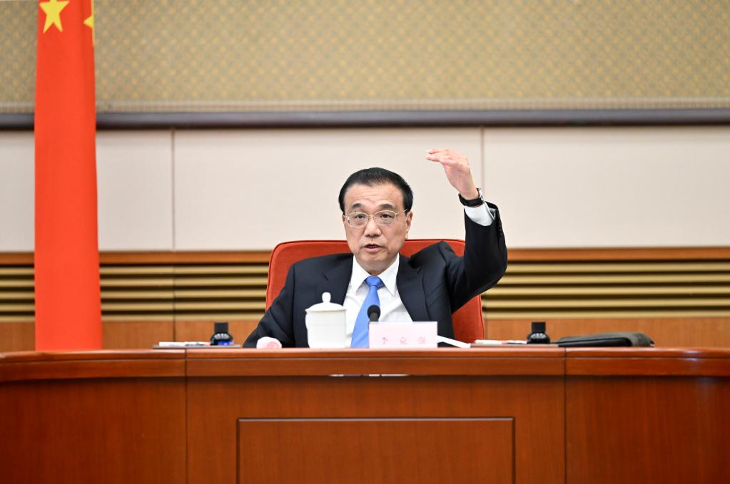 Chinese Premier Li Keqiang chairs a symposium to solicit opinions on a draft government work report from representatives of China's non-Communist parties, the All-China Federation of Industry and Commerce, and personages without party affiliation in Beijing, China, February 13, 2023. /Xinhua