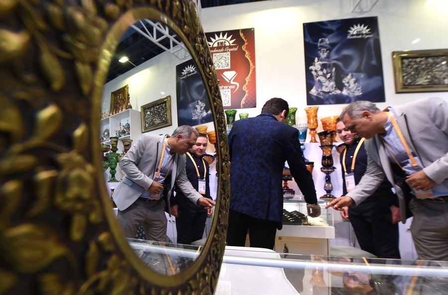 Exhibitors from Iran are seen at the Trade in Services exhibition area during the second China International Import Expo in Shanghai, China, November 5, 2019. /Xinhua
