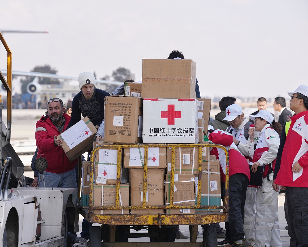A second batch of relief aid from China is unloaded at Damascus international airport in Damascus, Syria, February 13, 2023. /CFP
