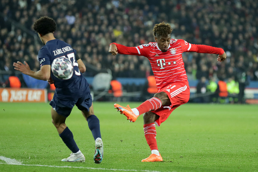 Kingsley Coman (R) of Bayern Munich shoots in the UEFA Champions League Round of 16 second-leg game against Paris Saint-Germain at the Parc des Princes in Paris, France, February 14, 2023. /CFP