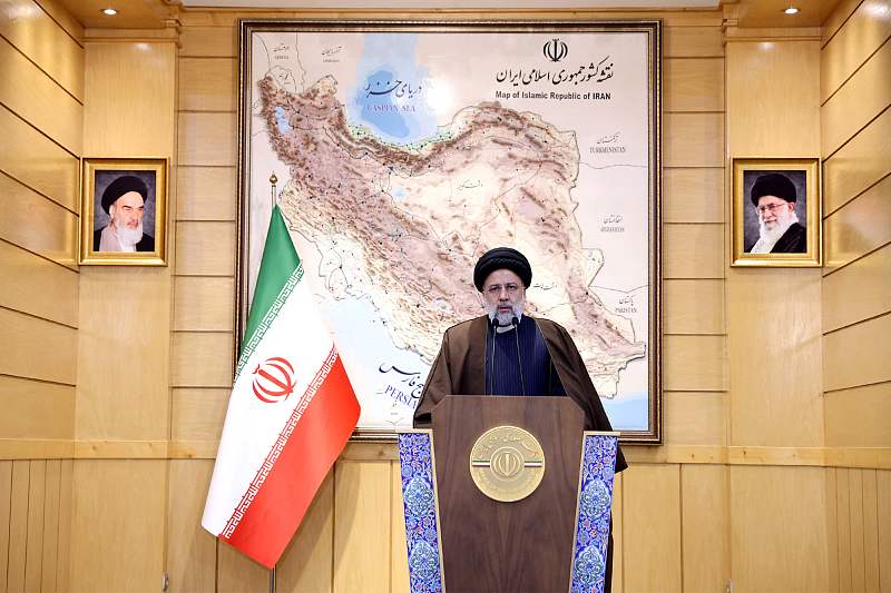 Iran's President Ebrahim Raisi addresses the media before he departs for a visit to China from the Mehrabad International Airport in Tehran, Iran, February 13, 2023. /CFP