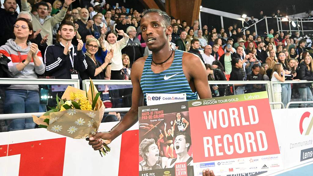 Lamecha Girma after setting a new world record and winning the men's indoor 3,000m final in Lievin, France, February 15, 2023. /CFP