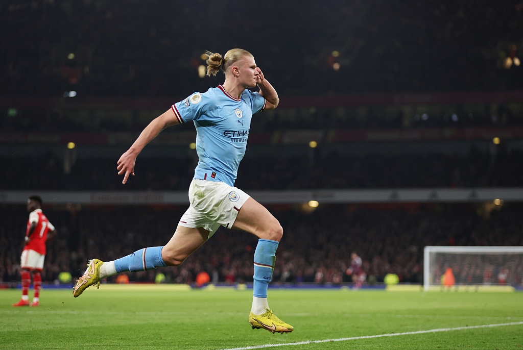 Erling Haaland of Manchester City celebrates after scoring the team's third goal during their clash with Arsenal at the Emirates Stadium in London, England, February 15, 2023. /CFP