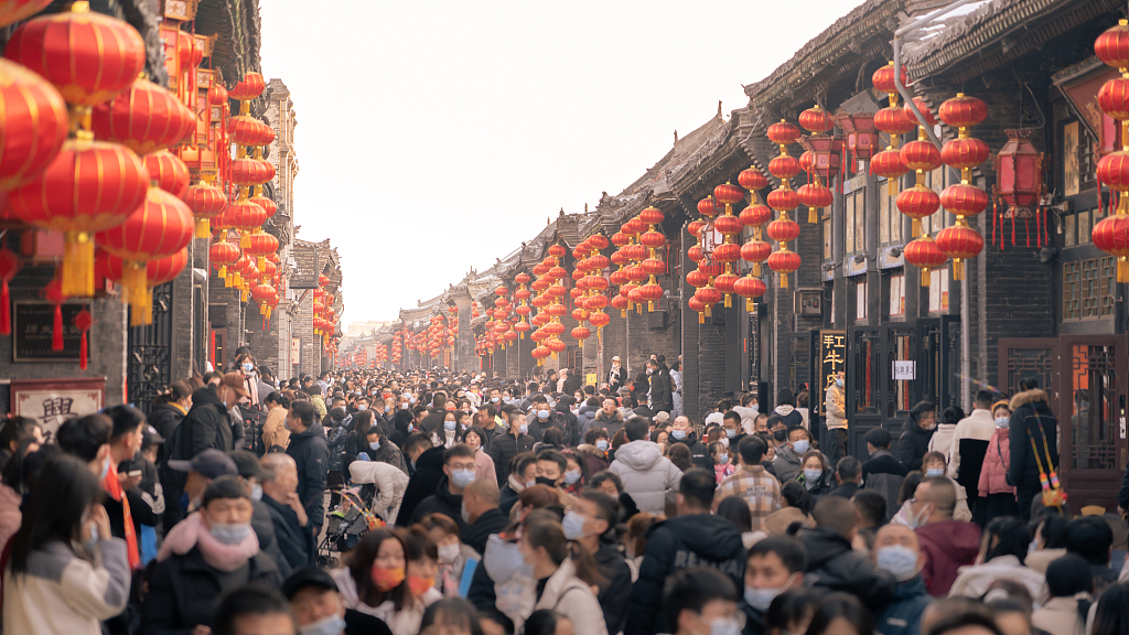 Tourists in the ancient town of Pingyao in Jinzhong, Shanxi Province, China, January 23, 2023. /2023