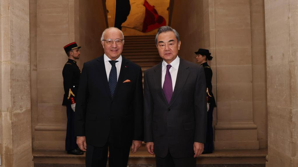 Wang Yi (R), director of the Office of the Foreign Affairs Commission of the Communist Party of China (CPC) Central Committee, meets with Laurent Fabius, president of the French Constitutional Council in Paris, France, February 16, 2023. /Xinhua