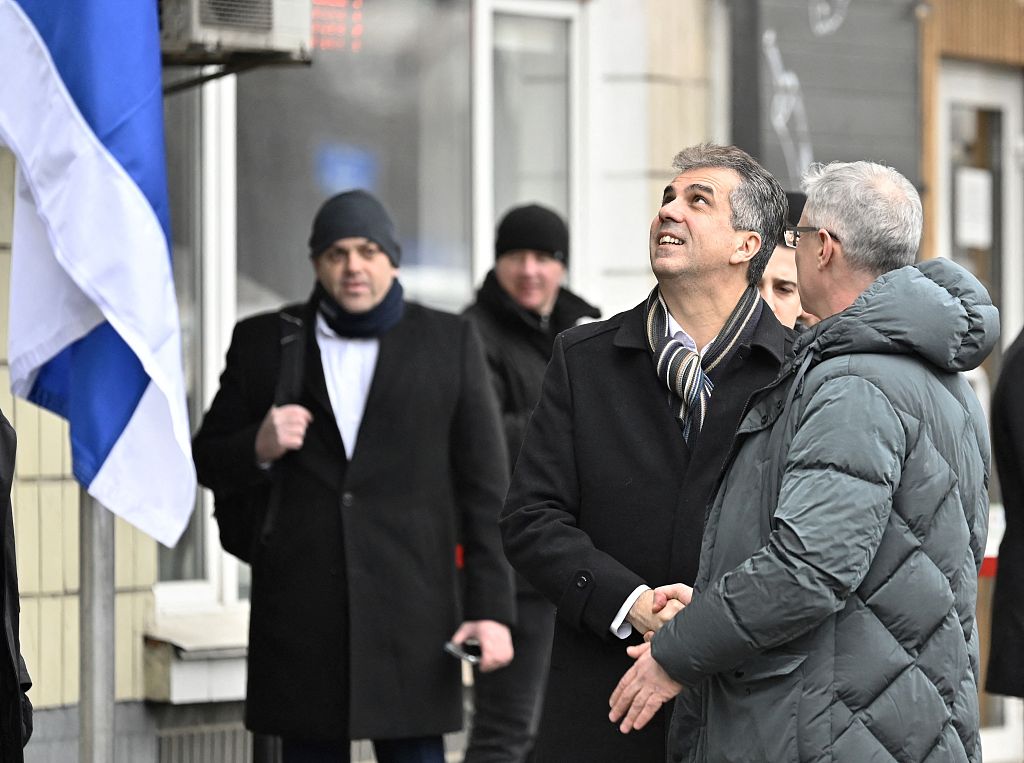 Eli Cohen (2nd R), Minister of Foreign Affairs of Israel, shakes hand with Michael Brodsky (R), Ambassador of Israel to Ukraine, during the reopening ceremony of the Israeli Embassy in Kyiv, Ukraine, February 16, 2023. /CFP