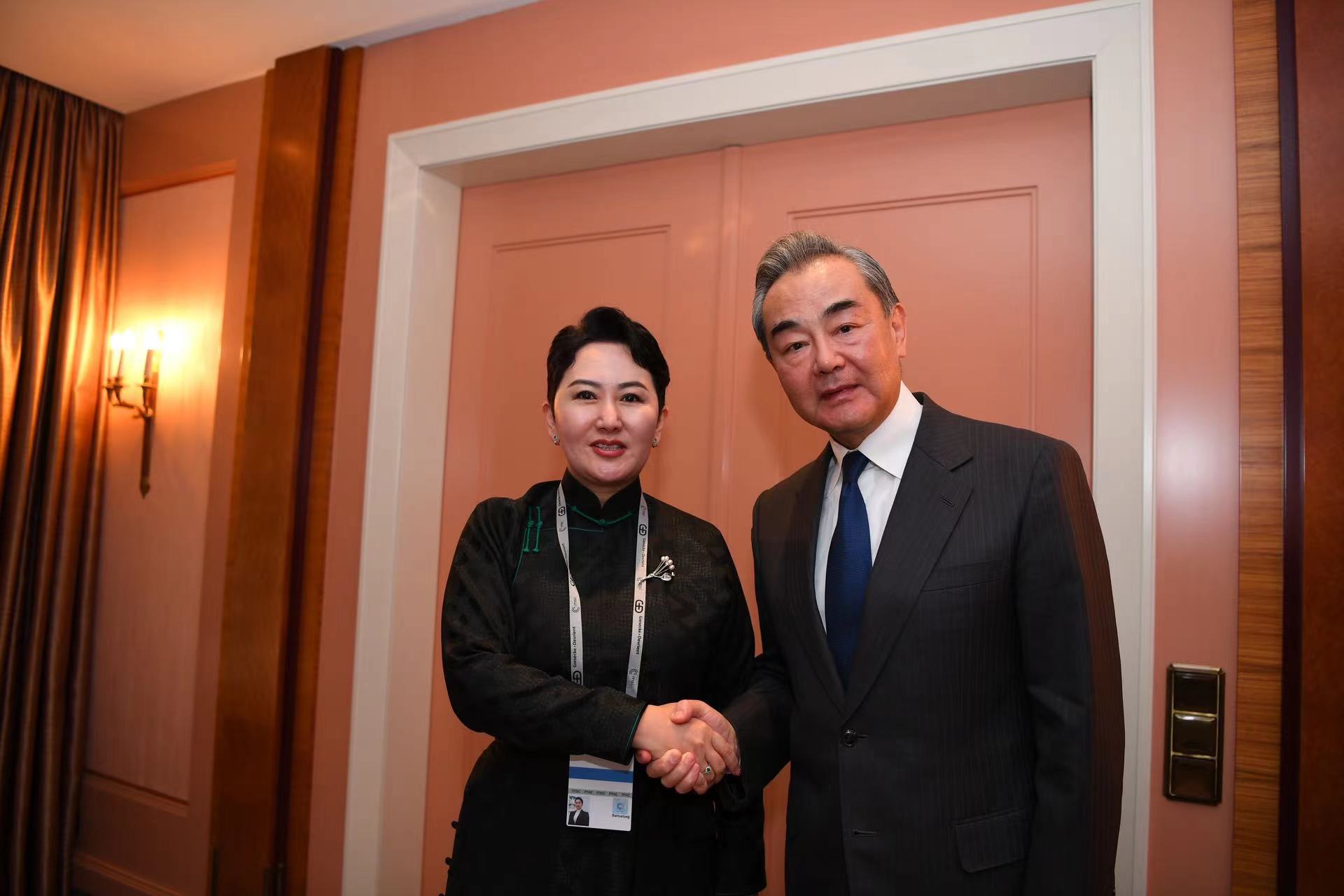 Wang Yi (R) meets with Mongolian Foreign Minister Batmunkh Battsetseg on the sidelines of the 59th Munich Security Conference in Munich, Germany, February 17, 2023. /CMG