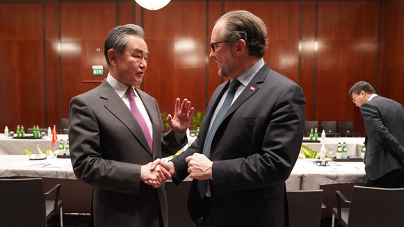 Wang Yi (L), a member of the Political Bureau of the CPC Central Committee and director of the Office of the Foreign Affairs Commission of the CPC Central Committee, meets with Austrian Foreign Minister Alexander Schallenberg in Munich, Germany, February 18, 2023. /Chinese Foreign Ministry