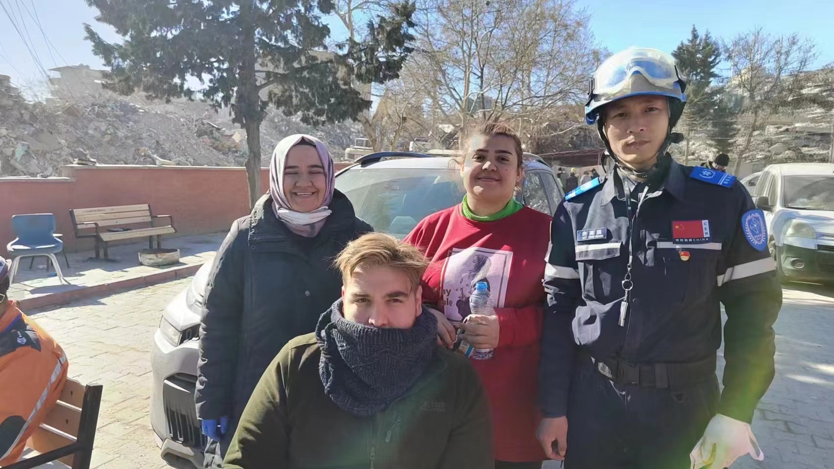 Xu Yingqiang (R1), Irem (L1) and other Turkish interpreters at a rescue site, Kahramanmaras, Türkiye, February 13, 2023. /Courtesy of Xu Yingqiang