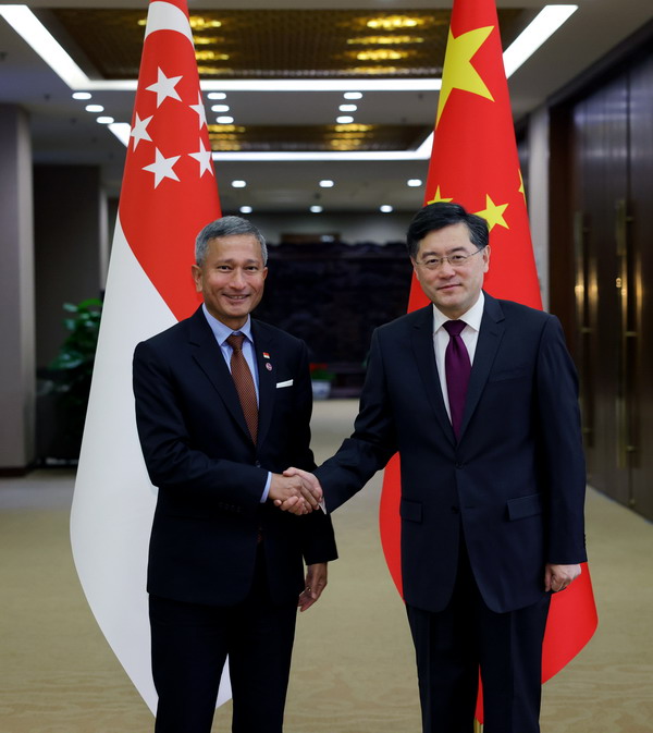 Chinese Foreign Minister Qin Gang (R) shakes hands with Singaporean Foreign Minister Vivian Balakrishnan during their meeting in Beijing, China, February 20, 2023. /Chinese Foreign Ministry