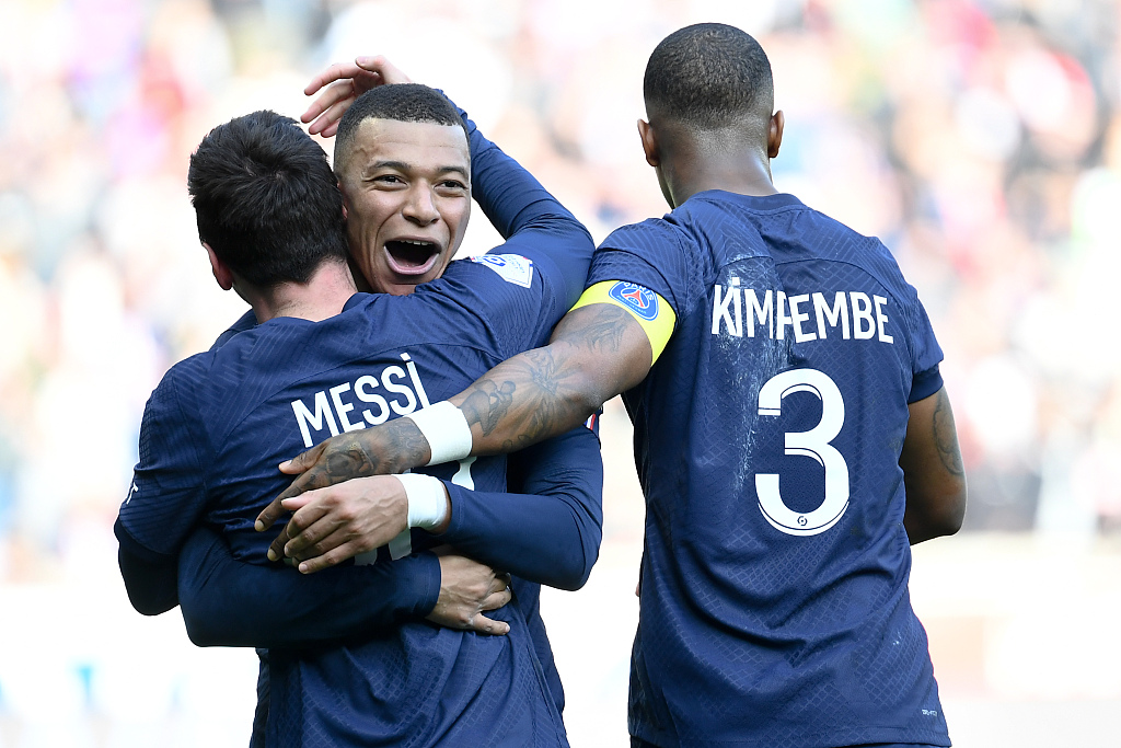 PSG's Lionel Messi is celebrated by Kylian Mbappe and Presnel Kimpembe (R) during their clash with Lille at the Parc des Princes stadium, in Paris, France, February 19, 2023. /CFP