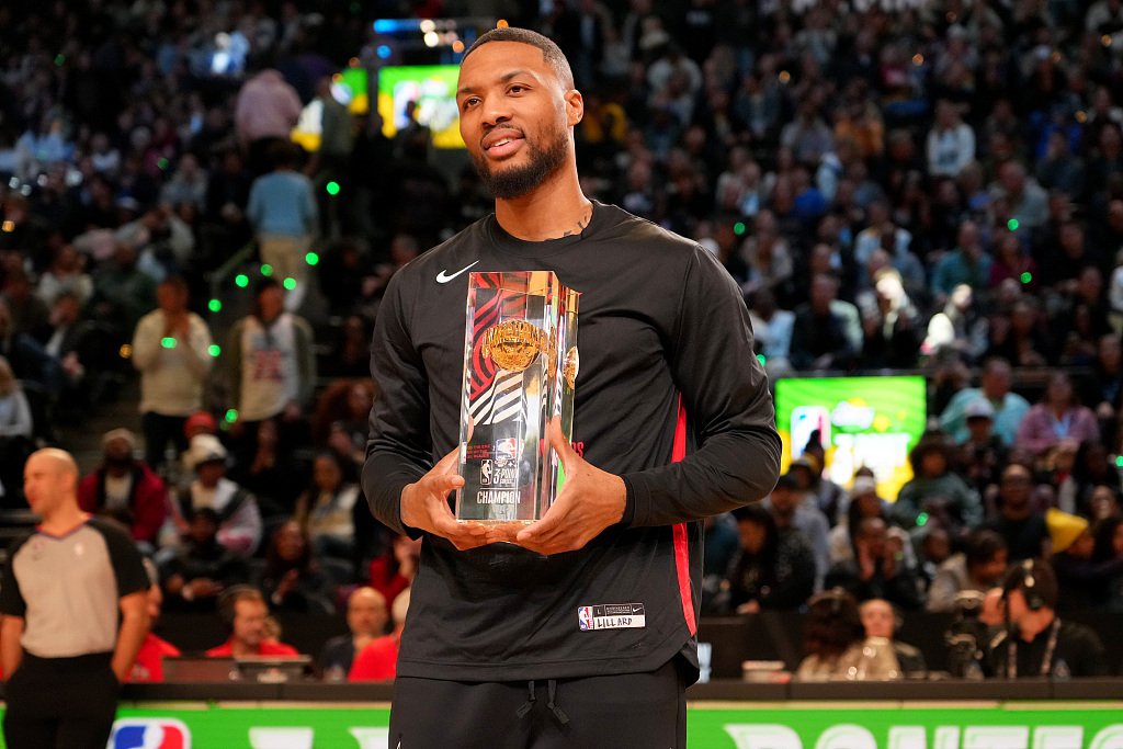 Damian Lillard #0 of the Portland Trail Blazers poses with the Starry 3-Point Contest trophy as part of 2023 NBA All Star Weekend at Vivint Arena in Salt Lake City, Utah, February 18, 2023. /CFP