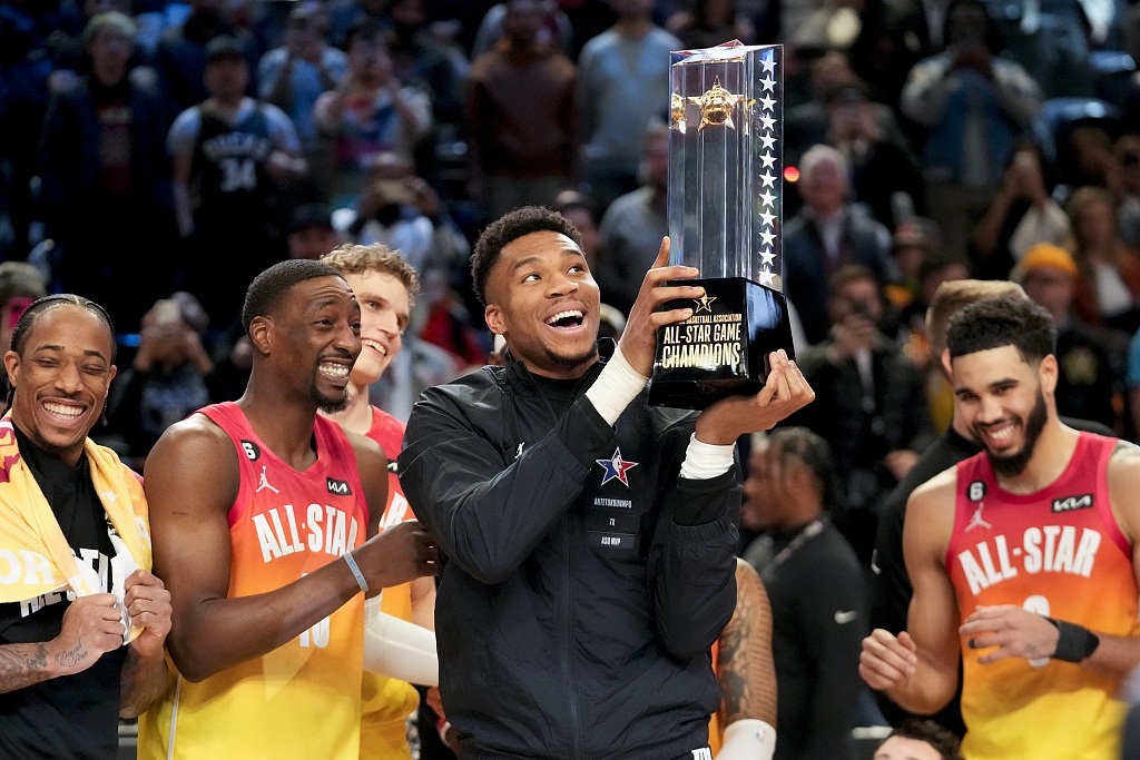 Giannis Antetokounmpo (C), captain of Team Giannis, celebrates with the NBA All-Star Game Championship trophy after the 184-175 win over Team LeBron at Vivint Arena in Salt Lake City, Utah, February 19, 2023. /CFP
