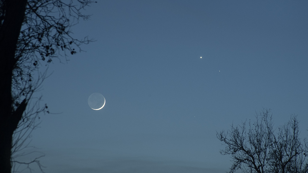 The moon, Saturn and Venus are all seen at once in Bayingolin Mongolian Autonomous Prefecture in northwest China's Xinjiang Uygur Autonomous Region, January 23, 2023. /CFP