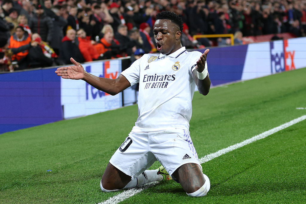Vinicius Junior of Real Madrid celebrates after scoring a goal in the first-leg game of the UEFA Champions League Round of 16 competitions against Liverpool at Anfield in Liverpool, England, February 21, 2023. /CFP