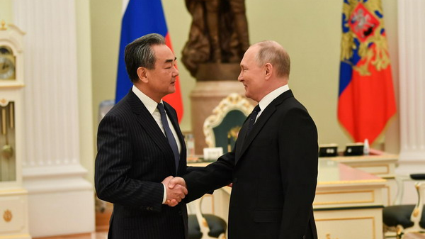 Wang Yi (L), director of the Office of the Foreign Affairs Commission of the Communist Party of China (CPC) Central Committee and a member of the Political Bureau of the CPC Central Committee, meets with Russian President Vladimir Putin in Moscow, Russia, February 22, 2023. /Chinese Foreign Ministry