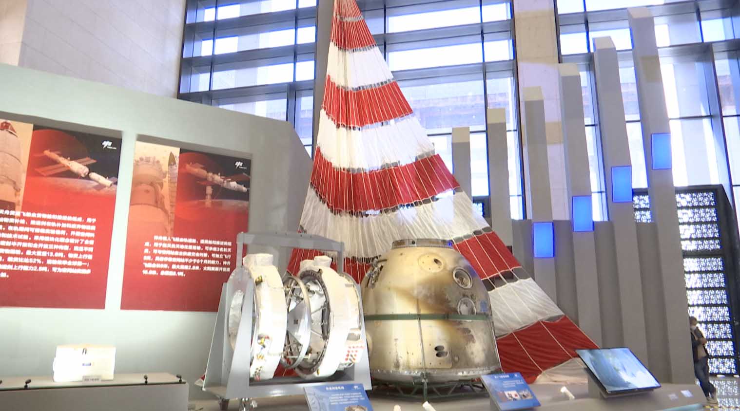 A model of the reentry capsule of China's Shenzhou-13 spacecraft is displayed at an exhibition in Beijing, China, February 24, 2023. /CGTN
