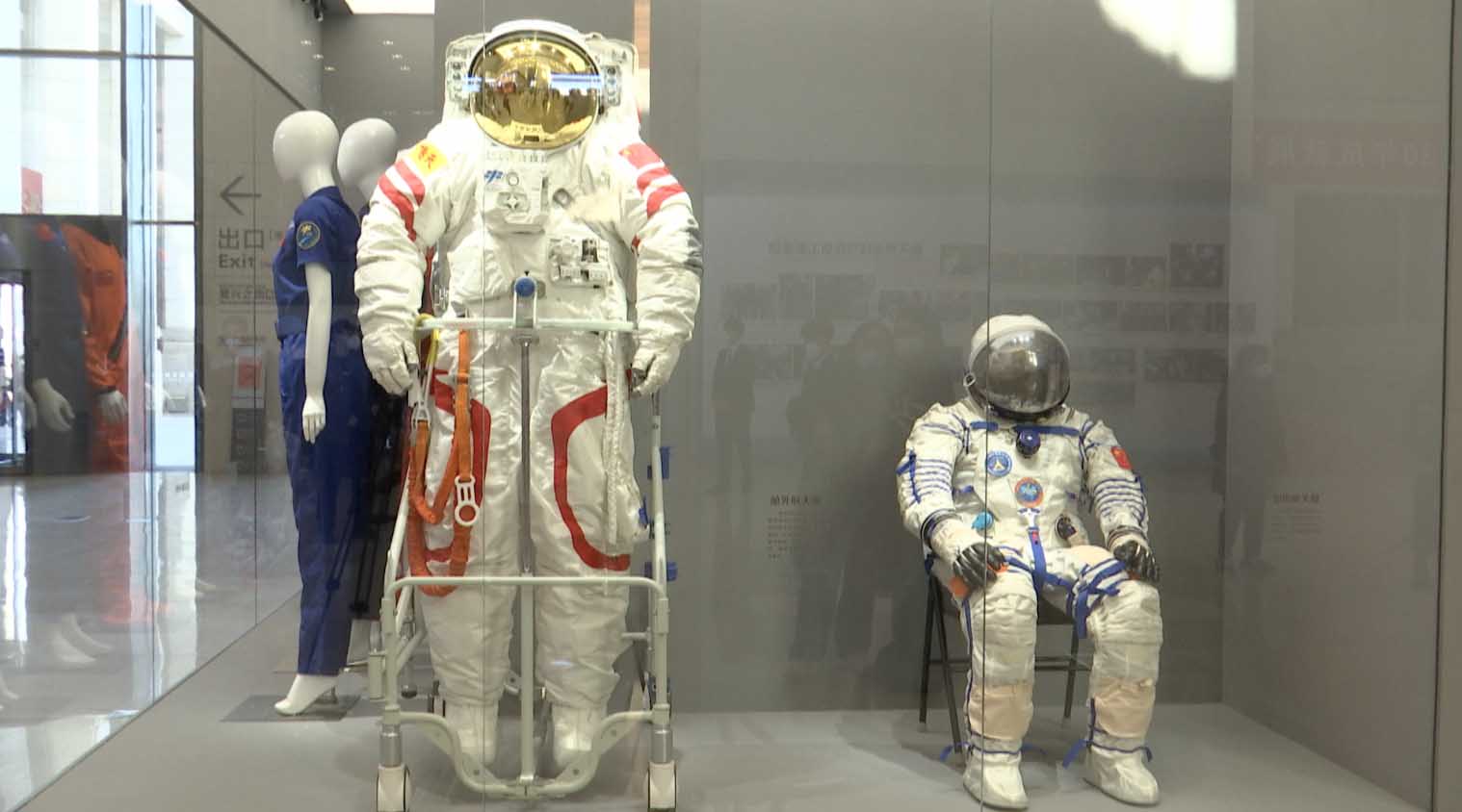 Models of Chinese space suits are displayed at an exhibition in Beijing, China, February 24, 2023. /CGTN